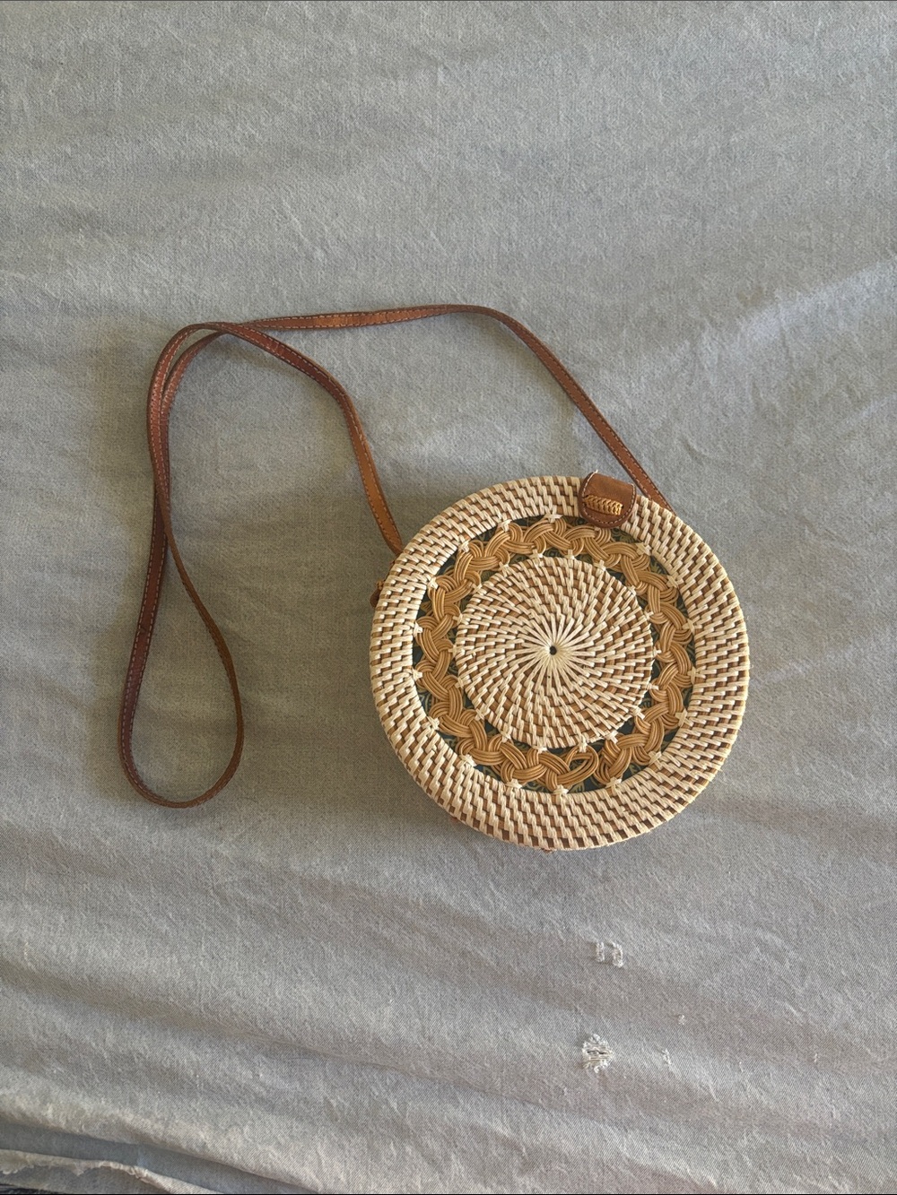 Round Woven Straw Crossbody Bag with Brown Leather Strap